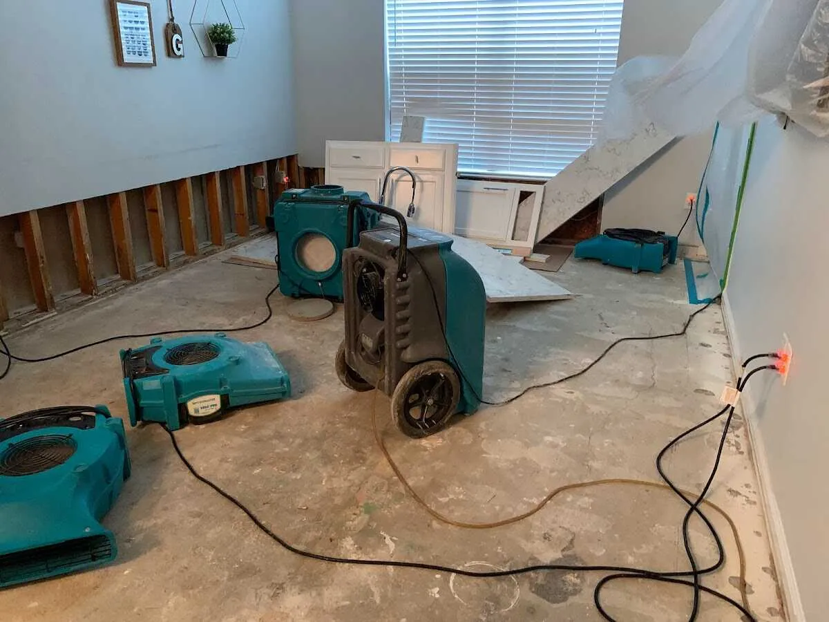 Dehumidifier in flood-cut room for Water Damage Restoration in Wilna